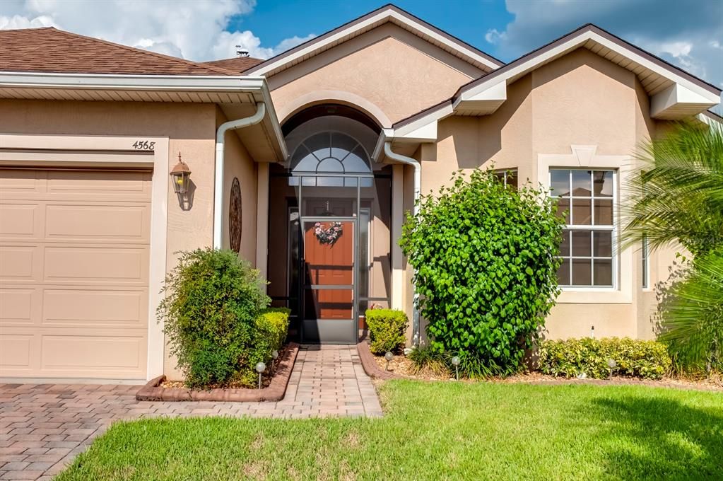 The bay window area in the front of the home is home to the second guest bedroom.