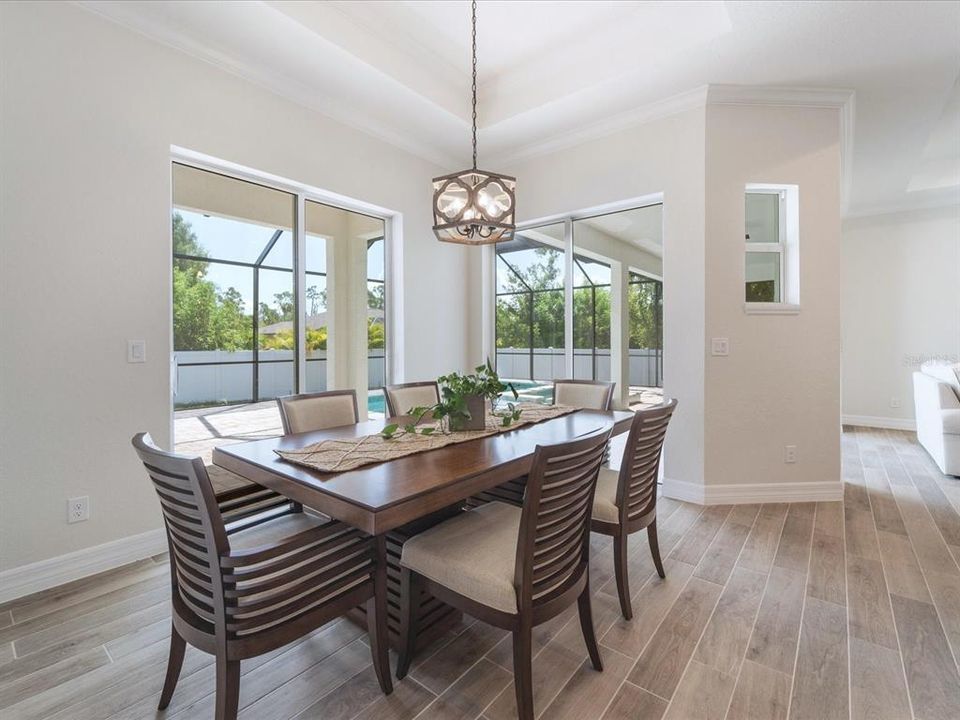 Dining area has two sliding glass doors