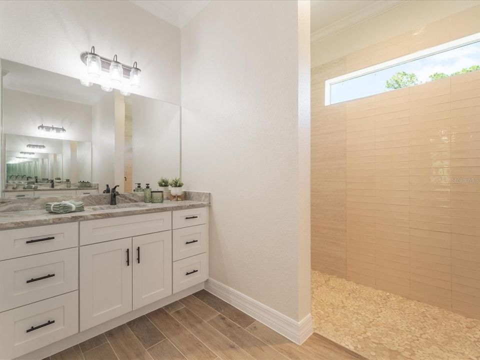 Master bathroom with split vanities