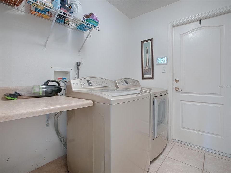 Laundry room with garage access