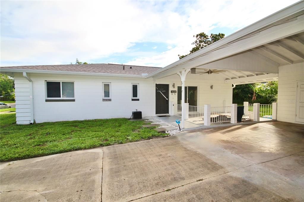 Front of home (carport and front covered porch)