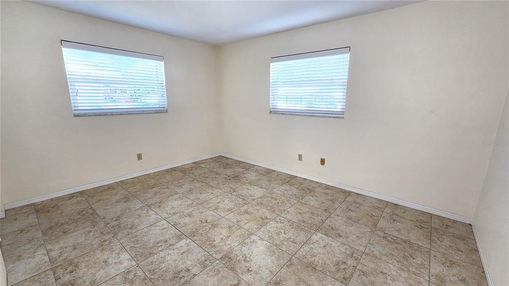 Guest bedroom at the front of the house which is approximately 14 x10