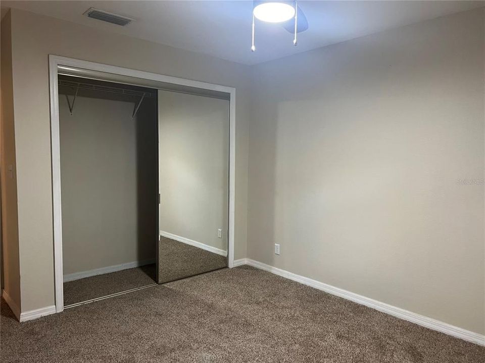 Bedroom with new carpet