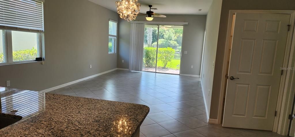 Livingroom looking to patio & lake view