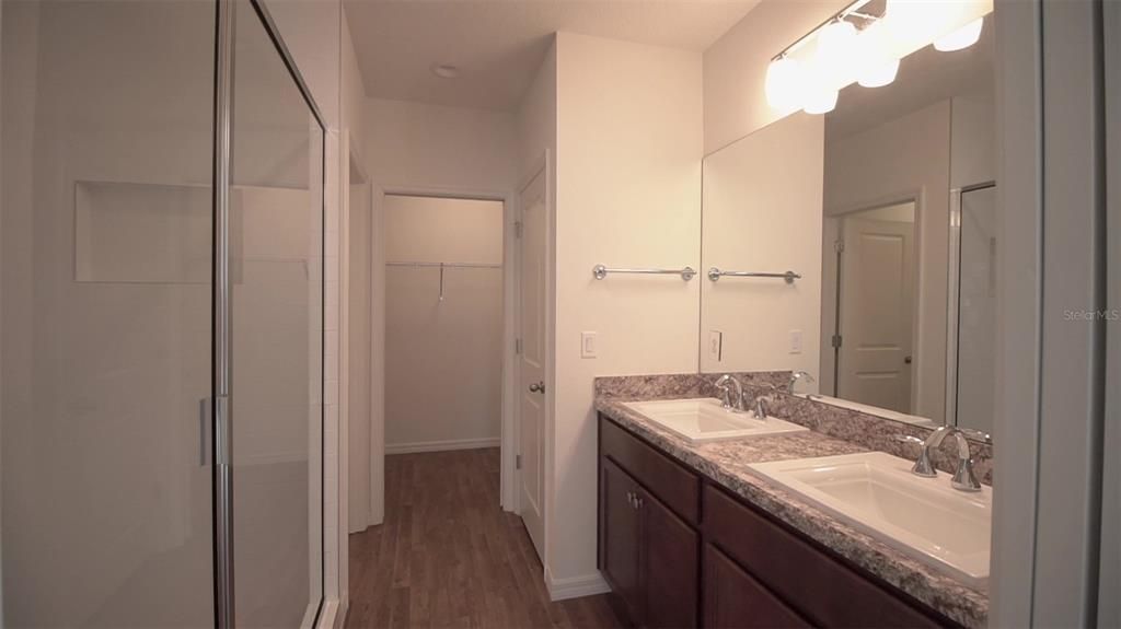 Primary Ensuite Bath and Walk-in Closet