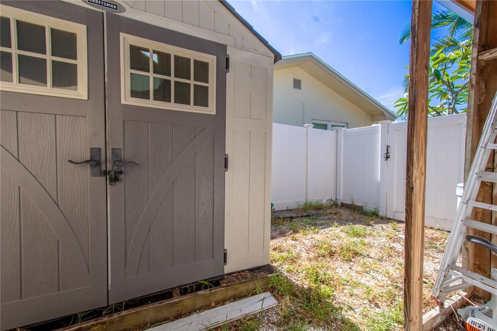 The home comes with a storage shed.