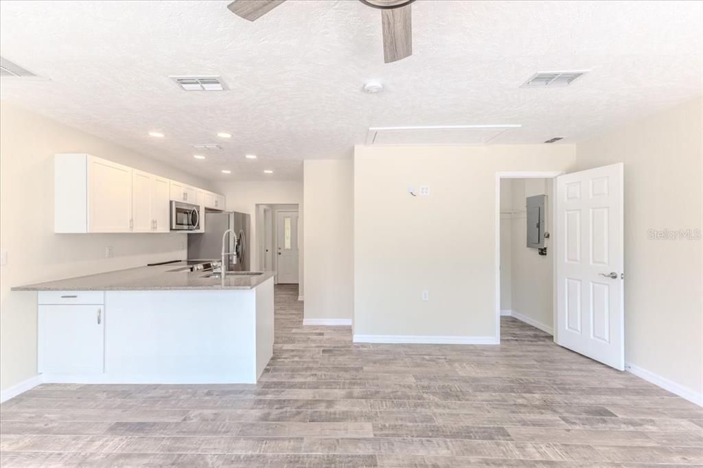 Kitchen with Granite Countertops with Stainless Steel Appliances