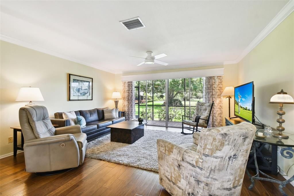 Beautiful Wood Floors Throughout Living/Dining Area