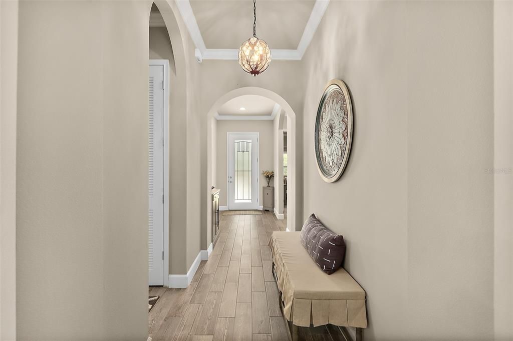 Hallway from Door to Living Areas w/Crown Molding