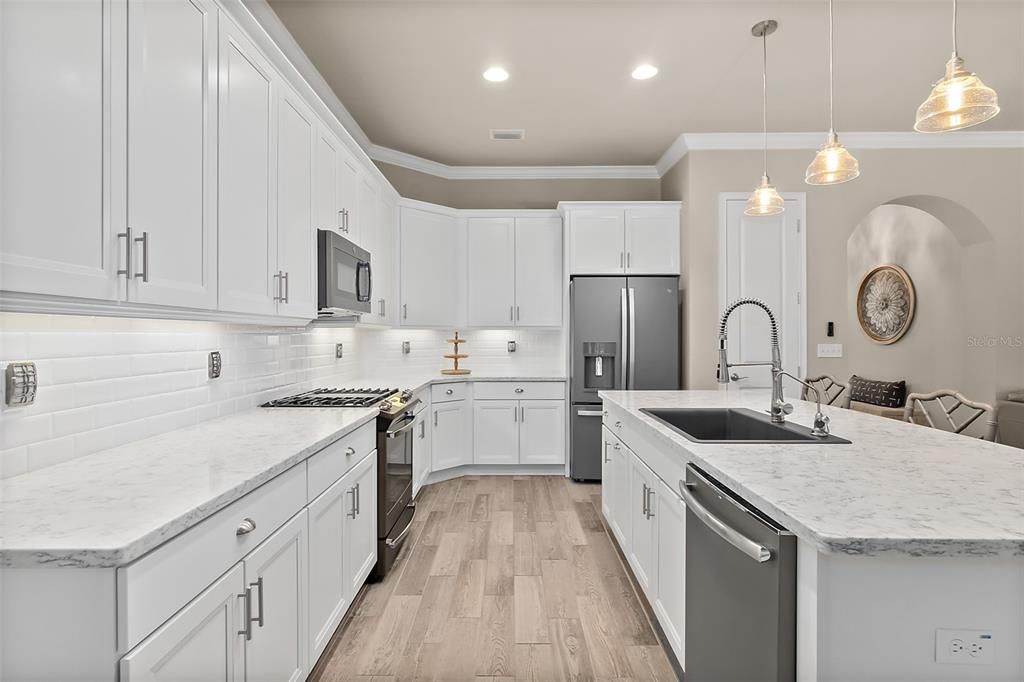 42" White Wood Cabinets & Stainless Steel Appliances