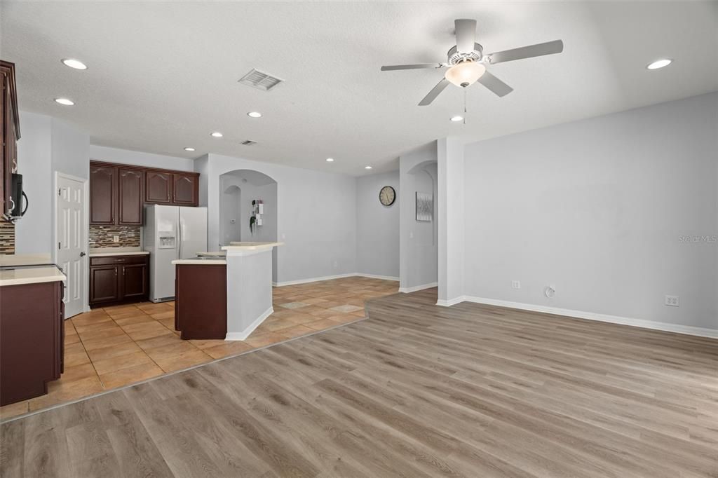 View of kitchen/dining and hall to master bedroom.