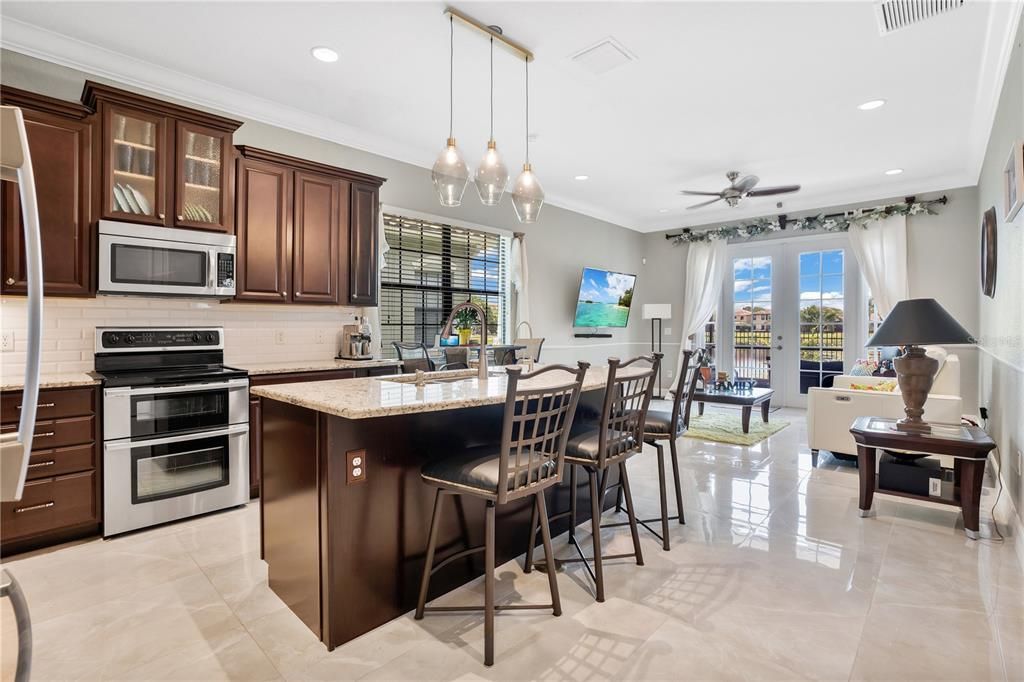 Large kitchen with granite countertops