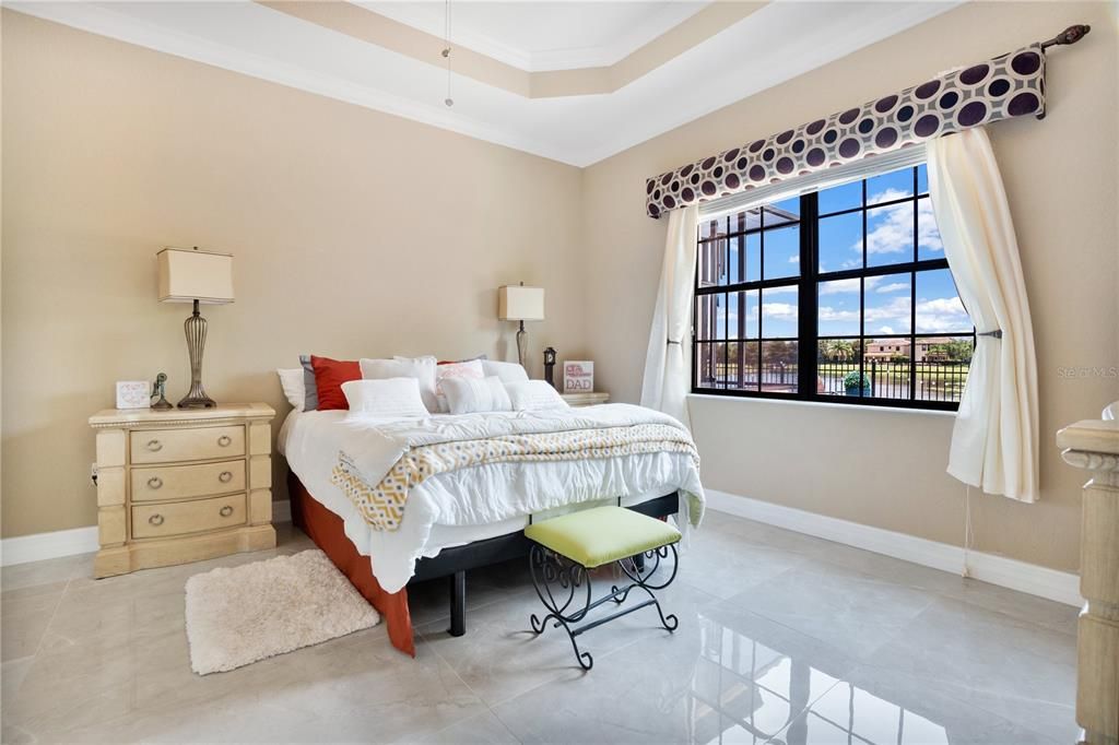 Primary bedroom with coffered ceiling