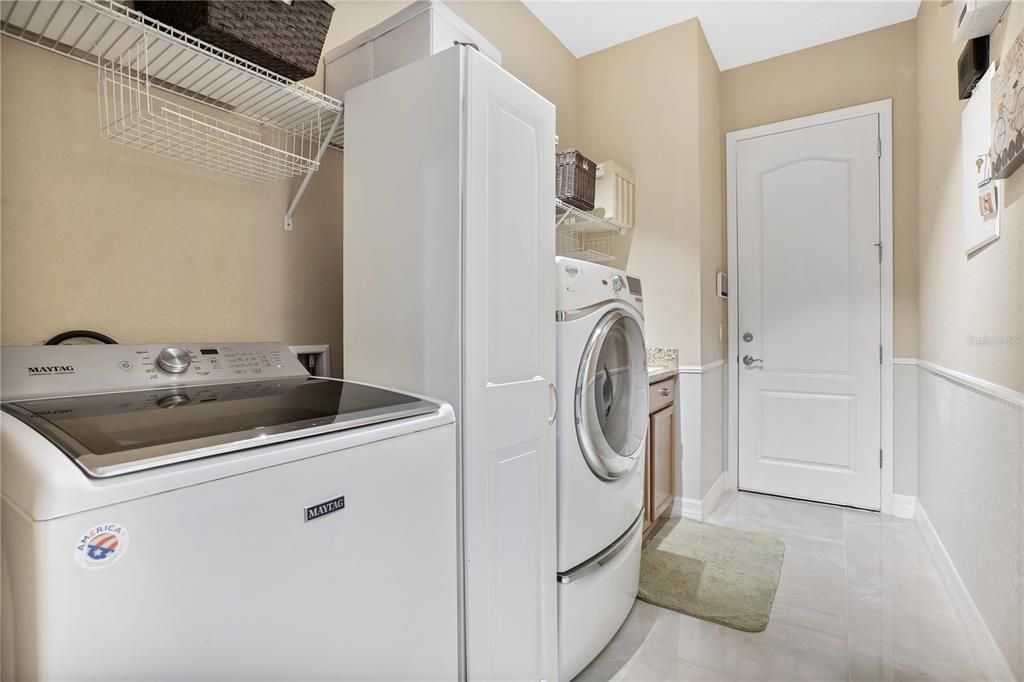 Laundry room with plenty of storage