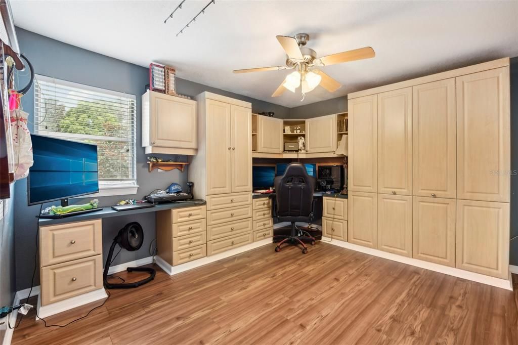 Bedroom 5 upstairs includes a murphy bed and built in office space