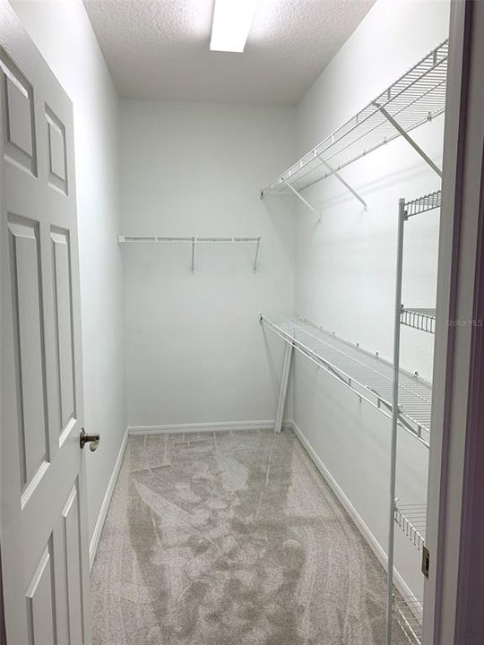 MASTER BEDROOM WALK IN CLOSET