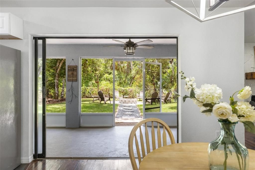 Sliders from dining room to lanai and fenced bacyard.