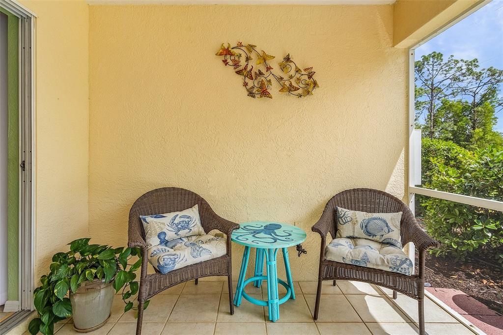 Large screened lanai, view of greenbelt and lake