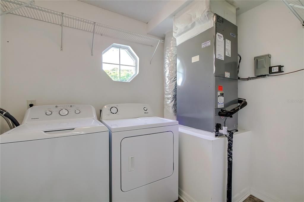 Newer Washer in Laundry Room