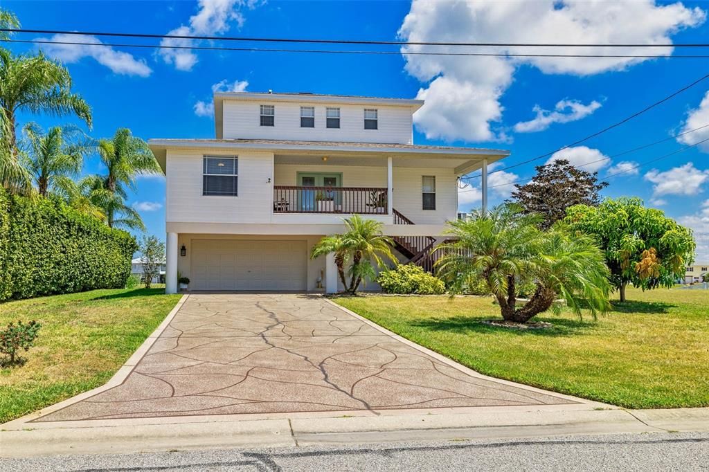 Drive up to front of residence.