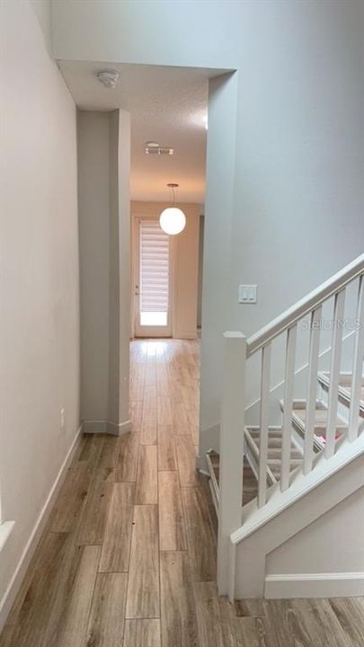 Front Hallway leading to Kitchen, Dining and Living Areas