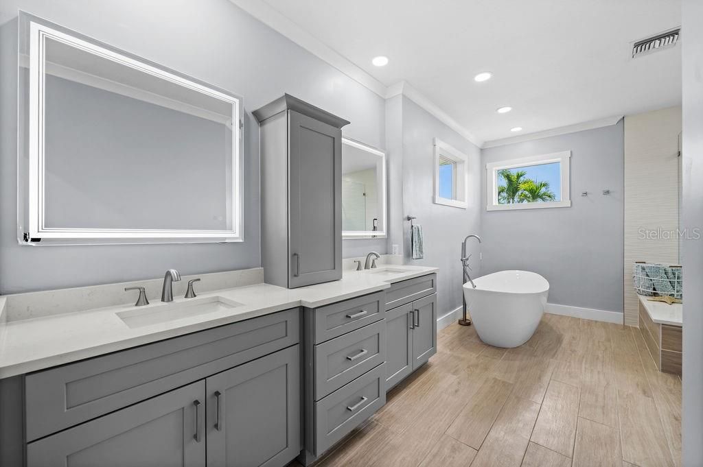 Dual sinks and LED mirrors in Master Bath