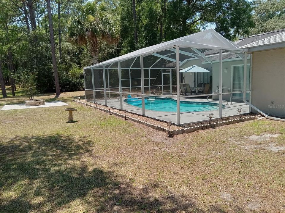 Fire Pit and Patio behind Pool