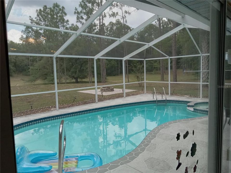 Fire Pit and Patio behind Pool