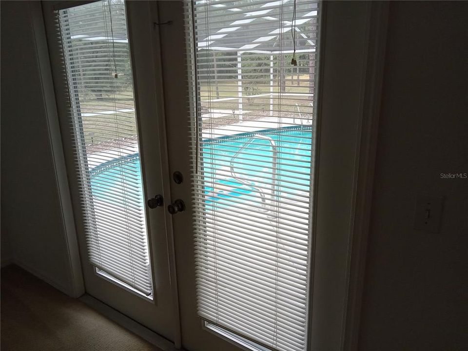 French Doors to the Pool from the Master Bedroom