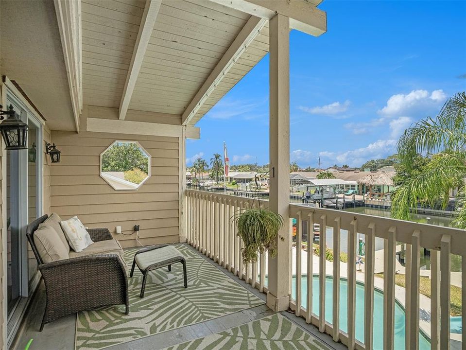 Extend your living space in the spacious sunroom patio by the pool!