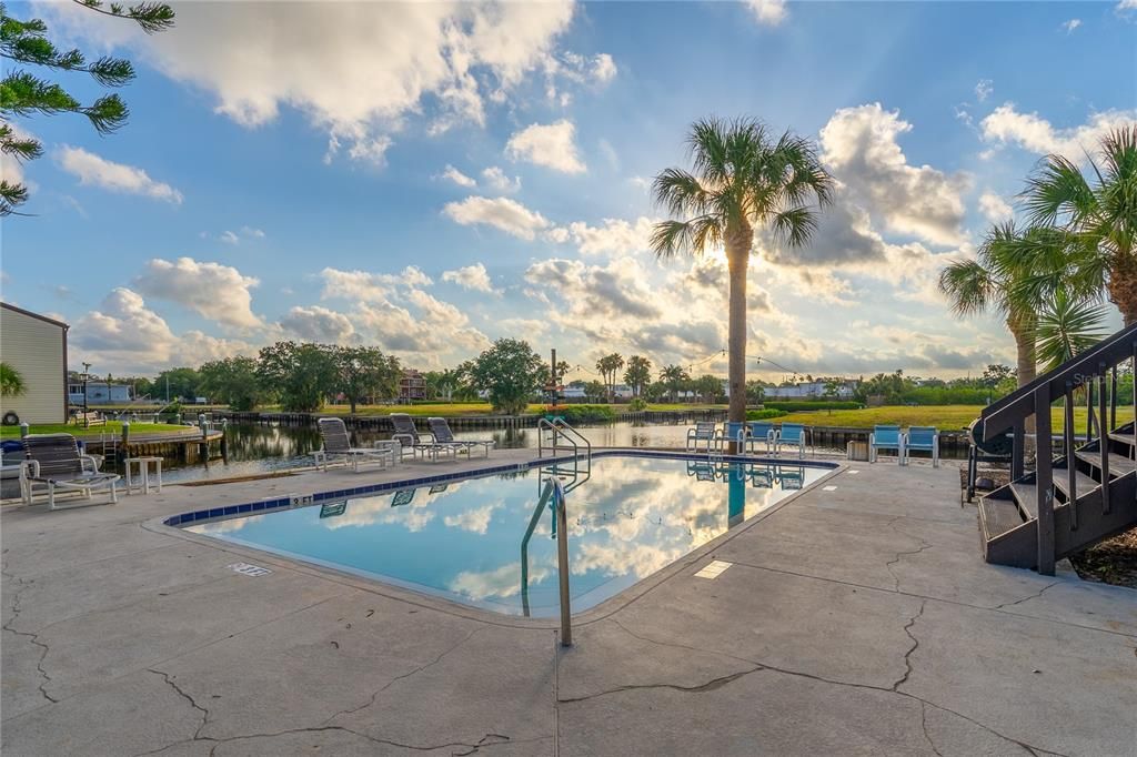 ENJOY THE SUNSET OR SUNRISE AT YOUR COMMUNITY WATERFRONT POOL!