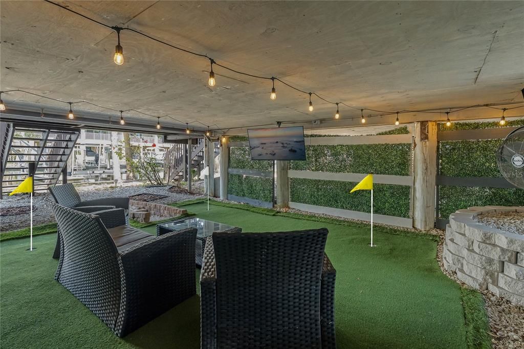 PUTTING GREEN IN THE COVERED PATIO!