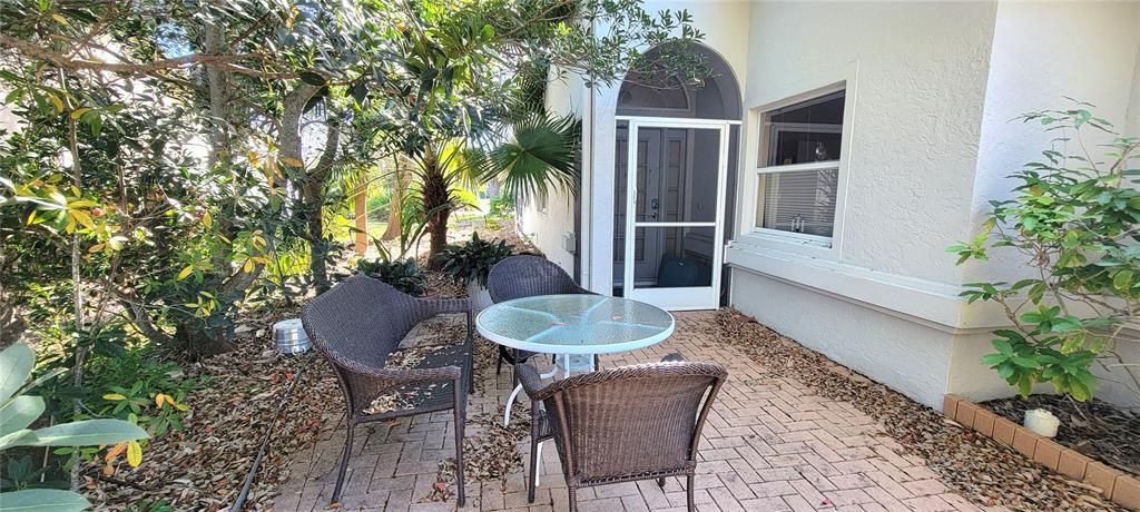 Lovely and inviting paver patio at the front entrance