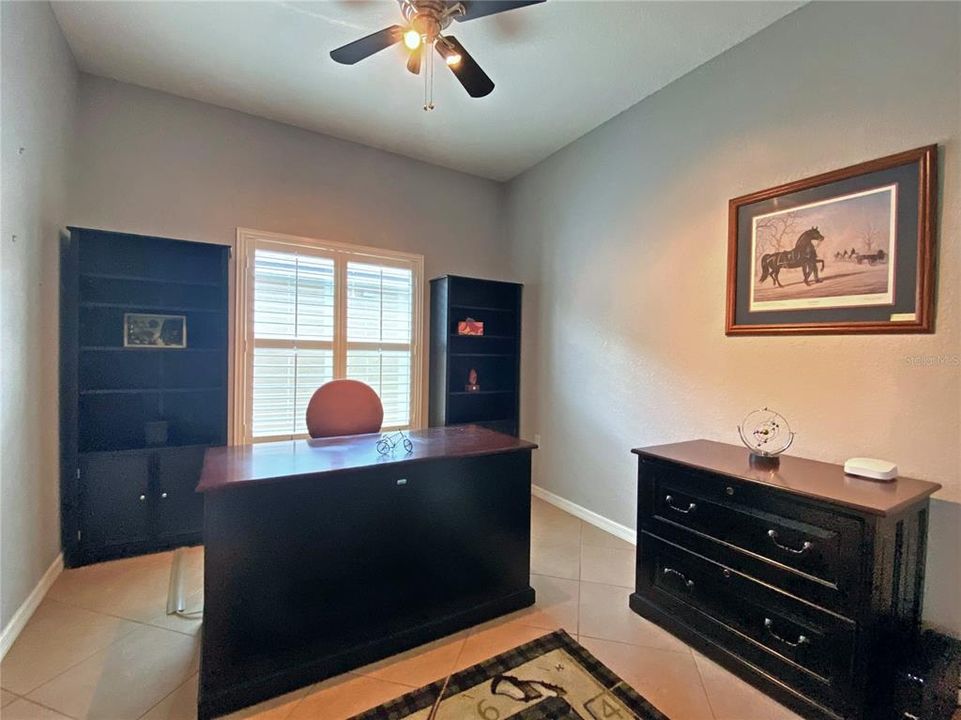 Plantation Shutters in the Den with tile on the Diagonal