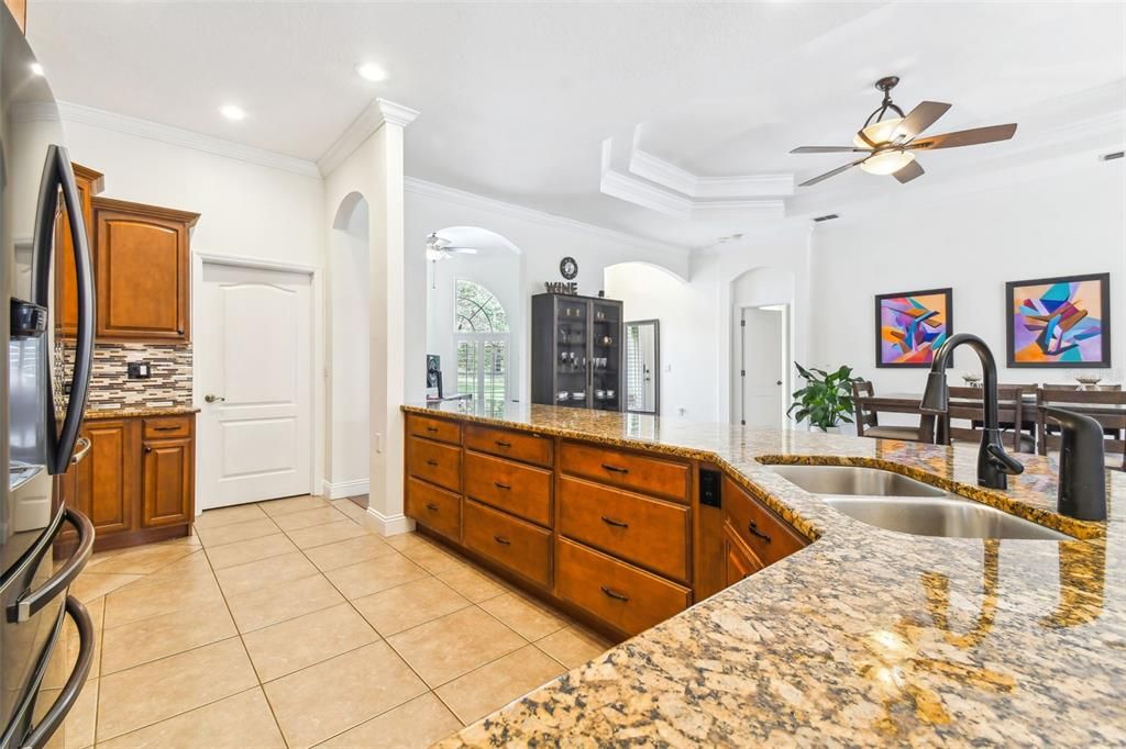 Kitchen/dining room area with office space to the left.