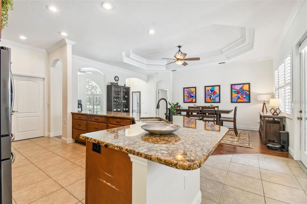 Large kitchen area with with plenty of room for bar stools.