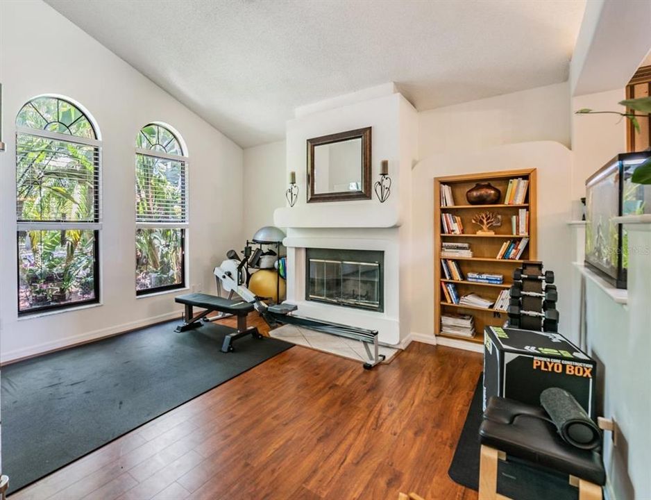 Formal Sitting Room off Foyer with Wood burning fireplace