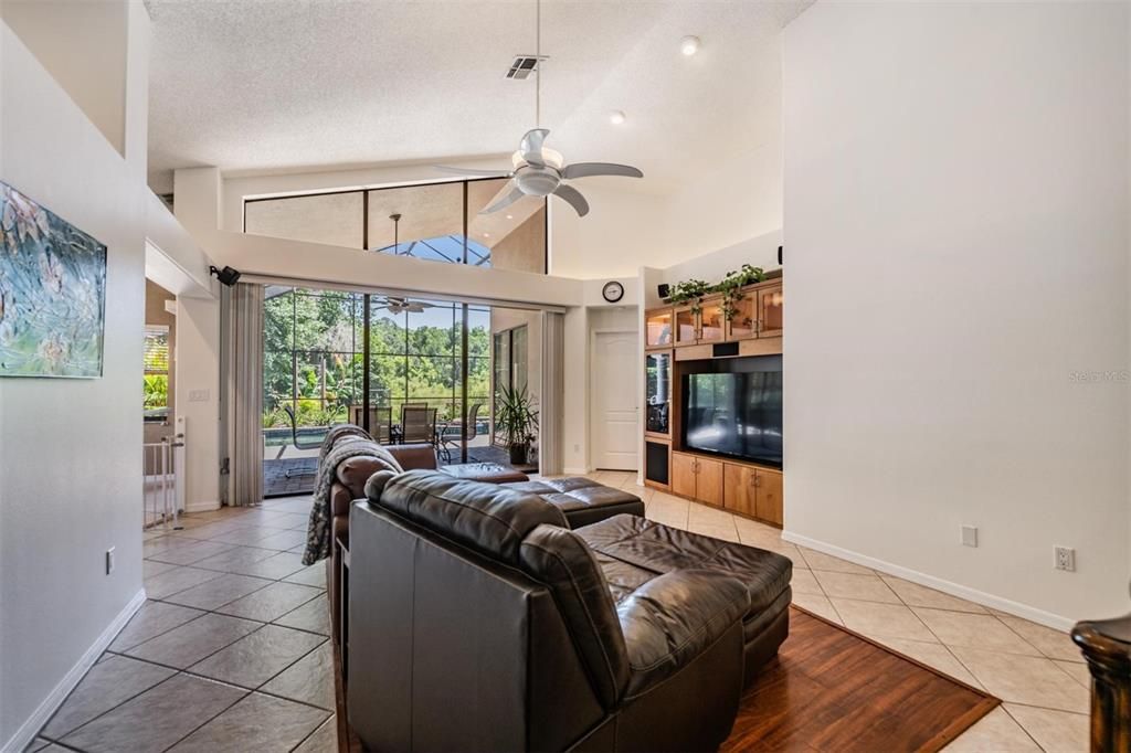 Living Room with view of Pool & Conservation