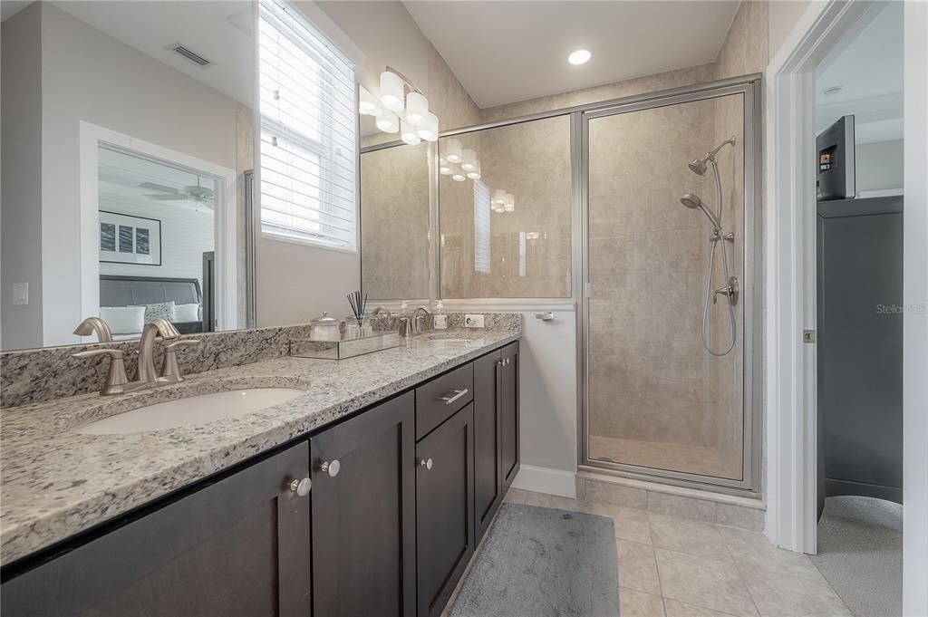 Primary bath with double sinks, granite countertops