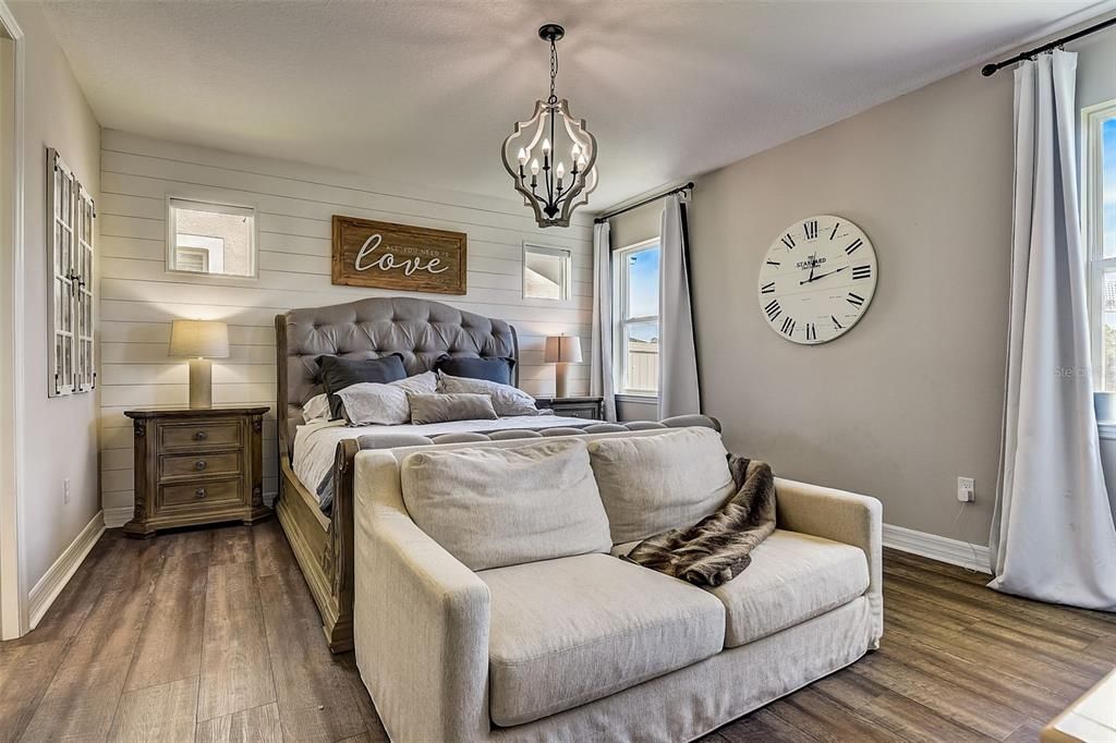 Primary bedroom with custom Ship-Lap accent walls