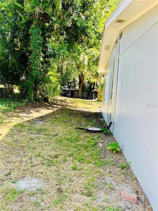 SIDE YARD AND WHERE A/C WILL BE INSTALLED