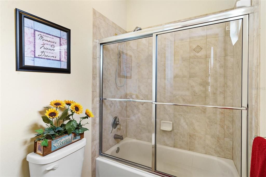 Second Primary Suite Bathroom with Tub and Shower Combo