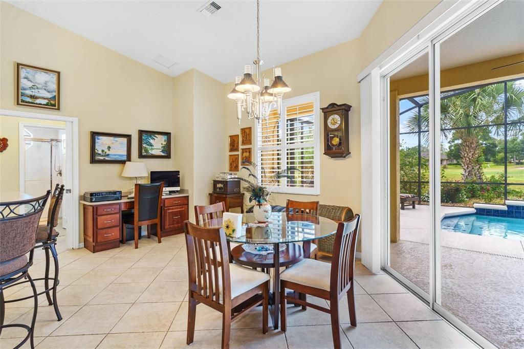 Dinette Area with Sliding Doors leading to Lanai and Pool Area