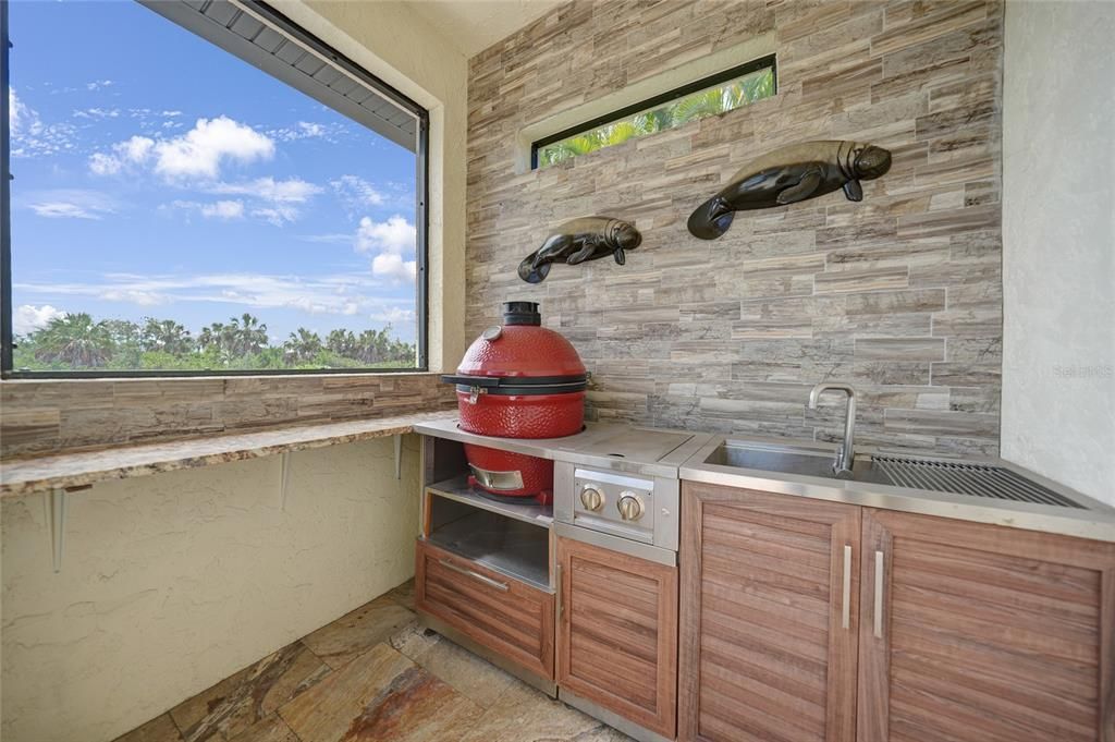 The outdoor kitchen even has an Egg!