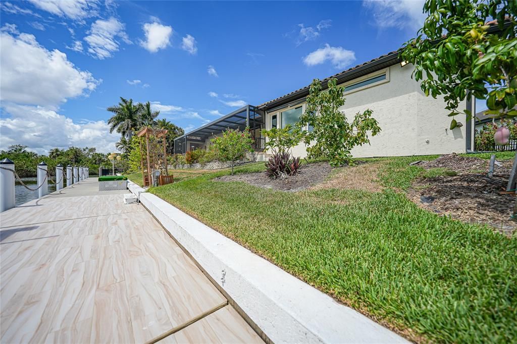 Lush landscaping, with smart irrigation surrounds the property.