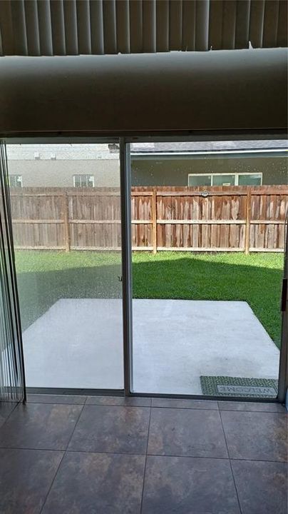 Sliding Door To Patio and Backyard