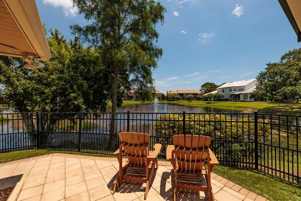 PATIO AREA OFF THE FAMILY ROOM OVERLOOKING THE POND.