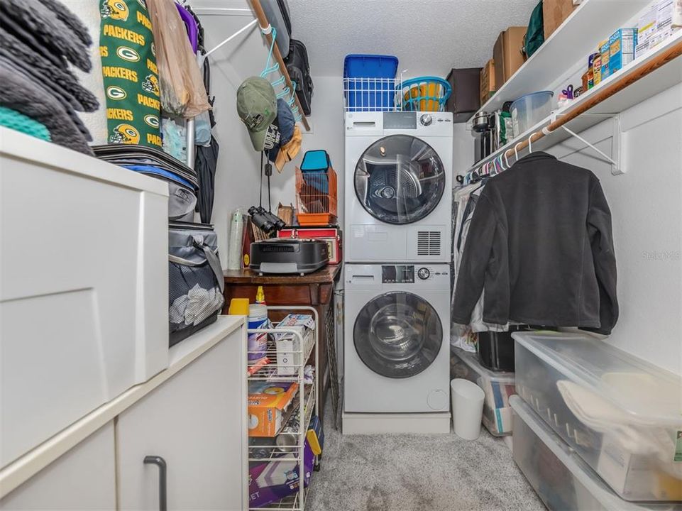 Second Bedroom Walk-in closet with washer and dryer