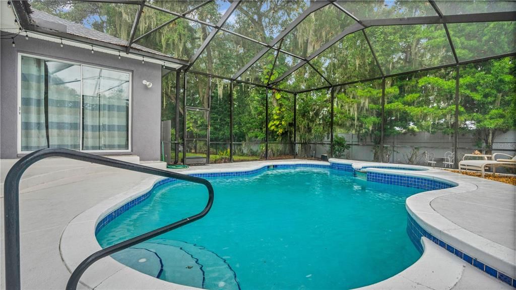 Saltwater heated pool with hot tub