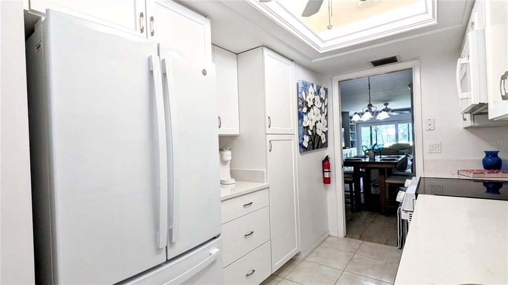 Dining area, built-in shelving defines spaces